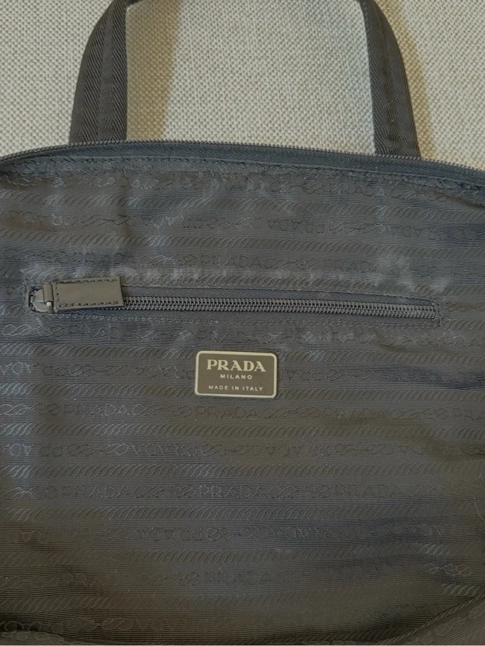 UNISEX PRADA Black Nylon Tote Bag with Silver Hardware Zipper and Padlock.